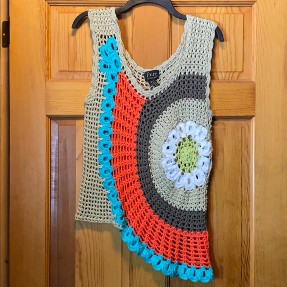 Pure Handknit sweater vest.